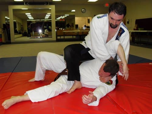 Homeland Heroes students grappling on mat