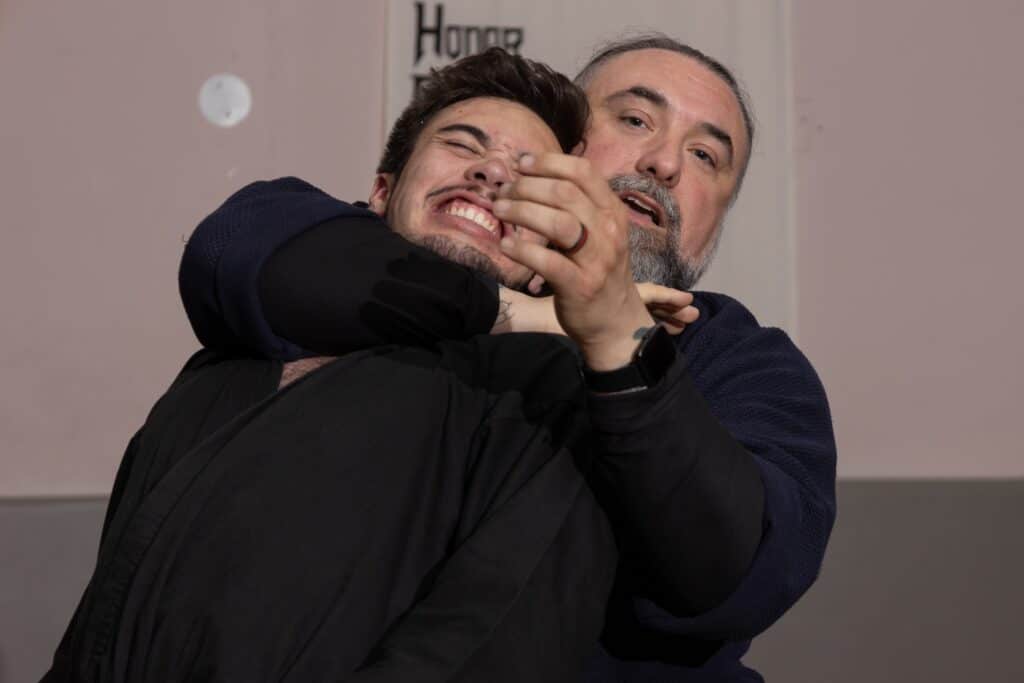 jujutsu class instructor at homeland heroes putting student in a hold