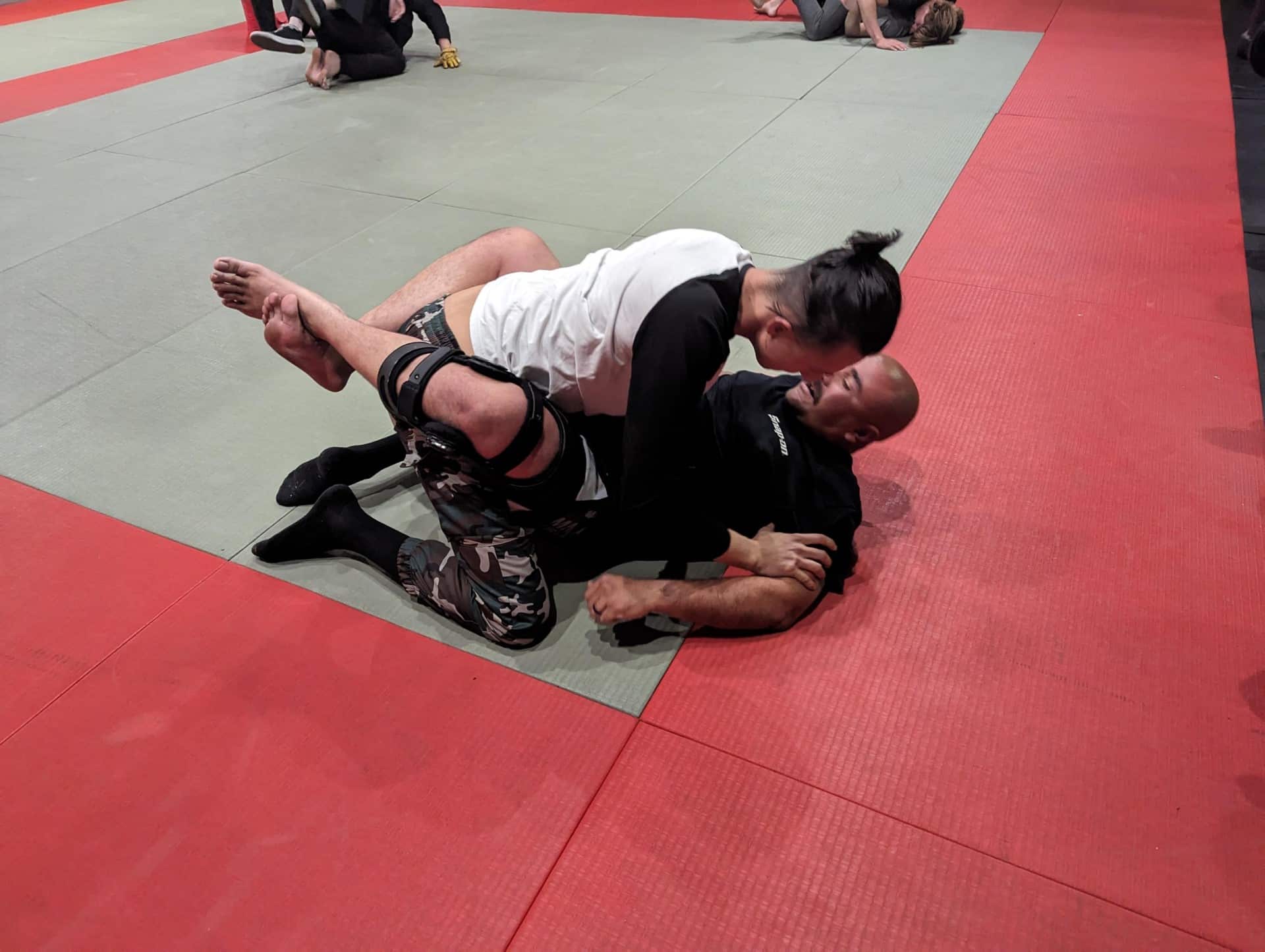 students of homeland heroes sparring in jujutsu class